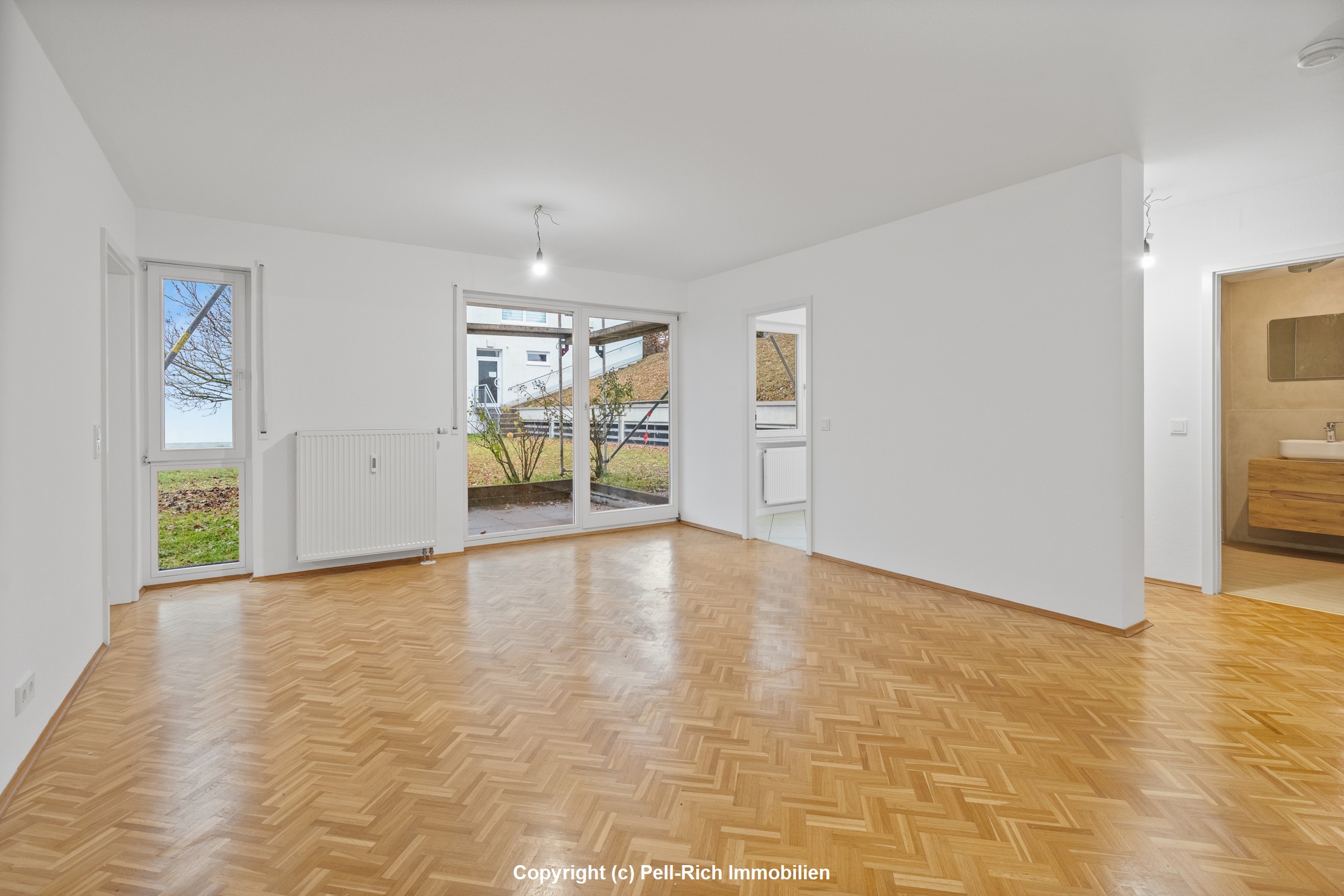 HEIDESEEBLICK: Souterrain-Wohnung mit Terrasse und Garage in Top Lage von Neureut